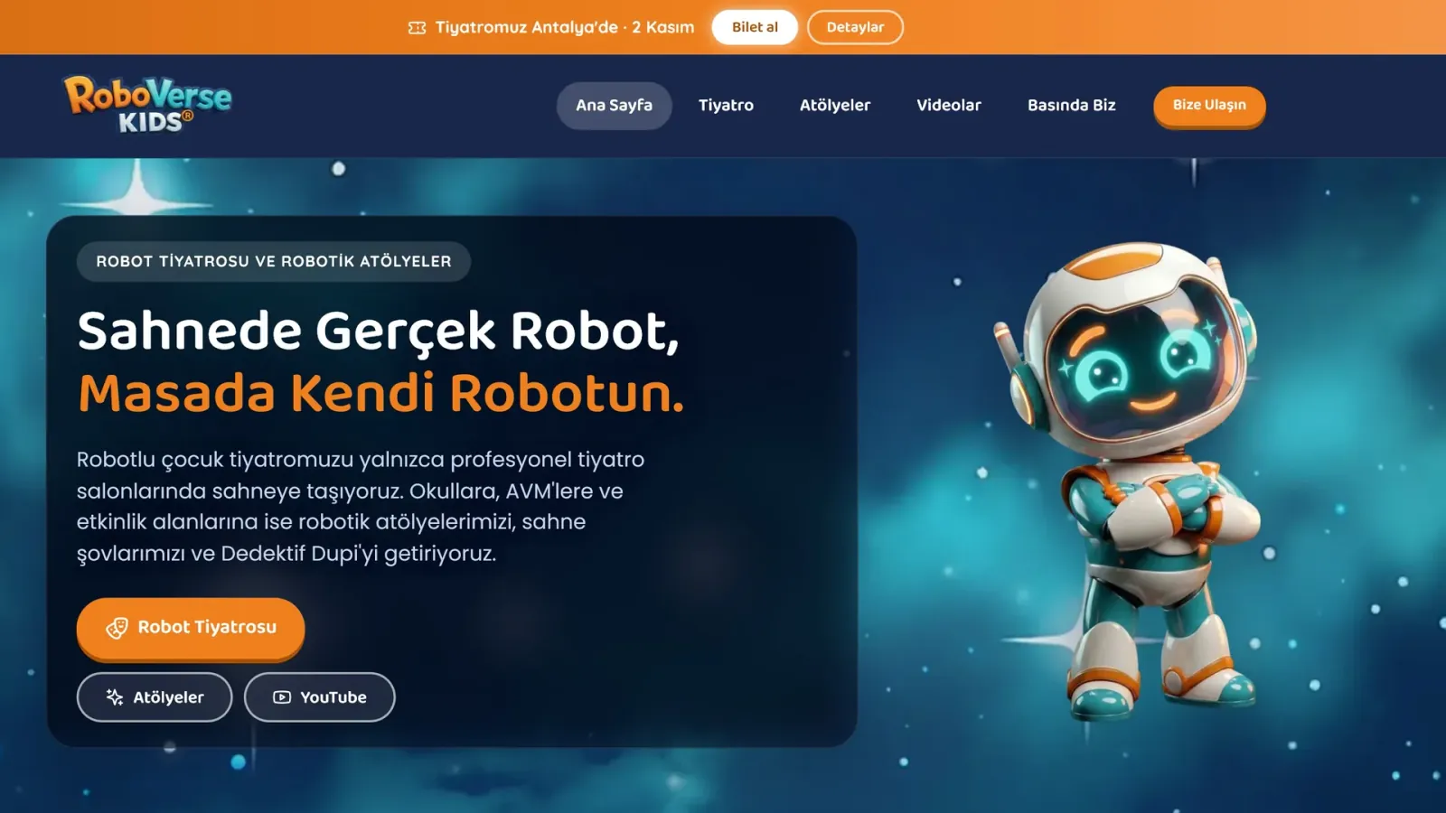roboversekids.com ana sayfasının açılışı: “Sahnede Gerçek Robot, Masada Kendi Robotun.” başlığı ve maskot Robby